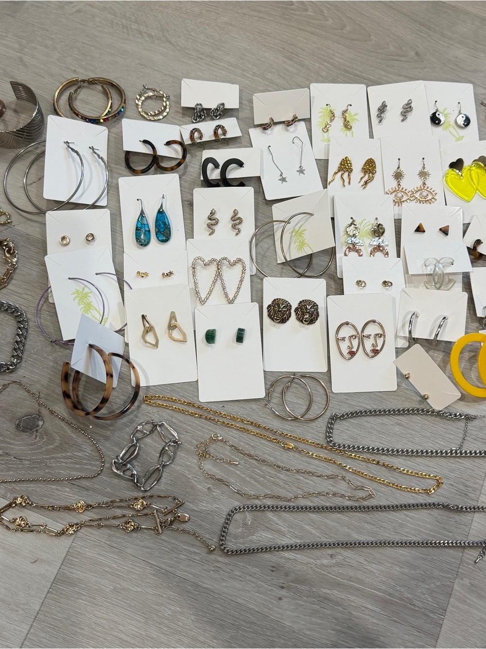 44 pairs of earrings, 5 bracelets, 6 necklaces